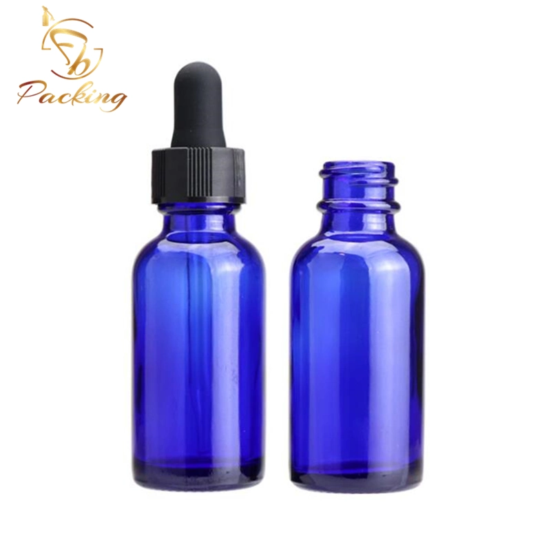 Cosmetics Boston Round Blue Glass Bottles of 30ml with Black Glass Dropper