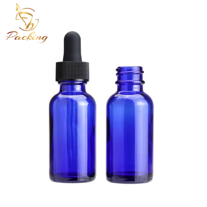 Cosmetics Boston Round Blue Glass Bottles of 30ml with Black Glass Dropper