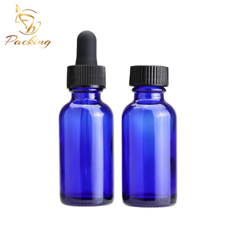 Cosmetics Boston Round Blue Glass Bottles of 30ml with Black Glass Dropper