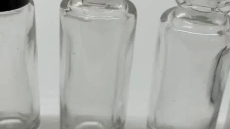 Rouleau transparent/ambre/givré épais de 5 ml sur une bouteille en verre